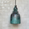 Moroccan Teal Glazed Pottery Bell Pendant Light - Installed Room Setting Warm Ambient Interior Illumination