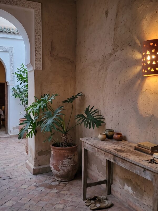 Moroccan Terracotta Pierced Dome Wall Sconce - Installed Room Setting Warm Ambient Interior Illumination
