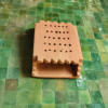 Moroccan Terracotta Grid Perforated Wall Sconce - Illuminated Night Shadow Pattern and Pierced Light Projection