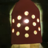 Moroccan Terracotta Cylinder Wall Sconce - Illuminated Night Shadow Pattern and Pierced Light Projection