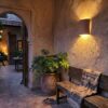 Moroccan Terracotta Openwork Wall Sconce - Installed Room Setting Warm Ambient Interior Illumination