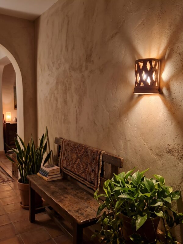 Moroccan Terracotta Lattice Wall Sconce - Installed Room Setting Warm Ambient Interior Illumination